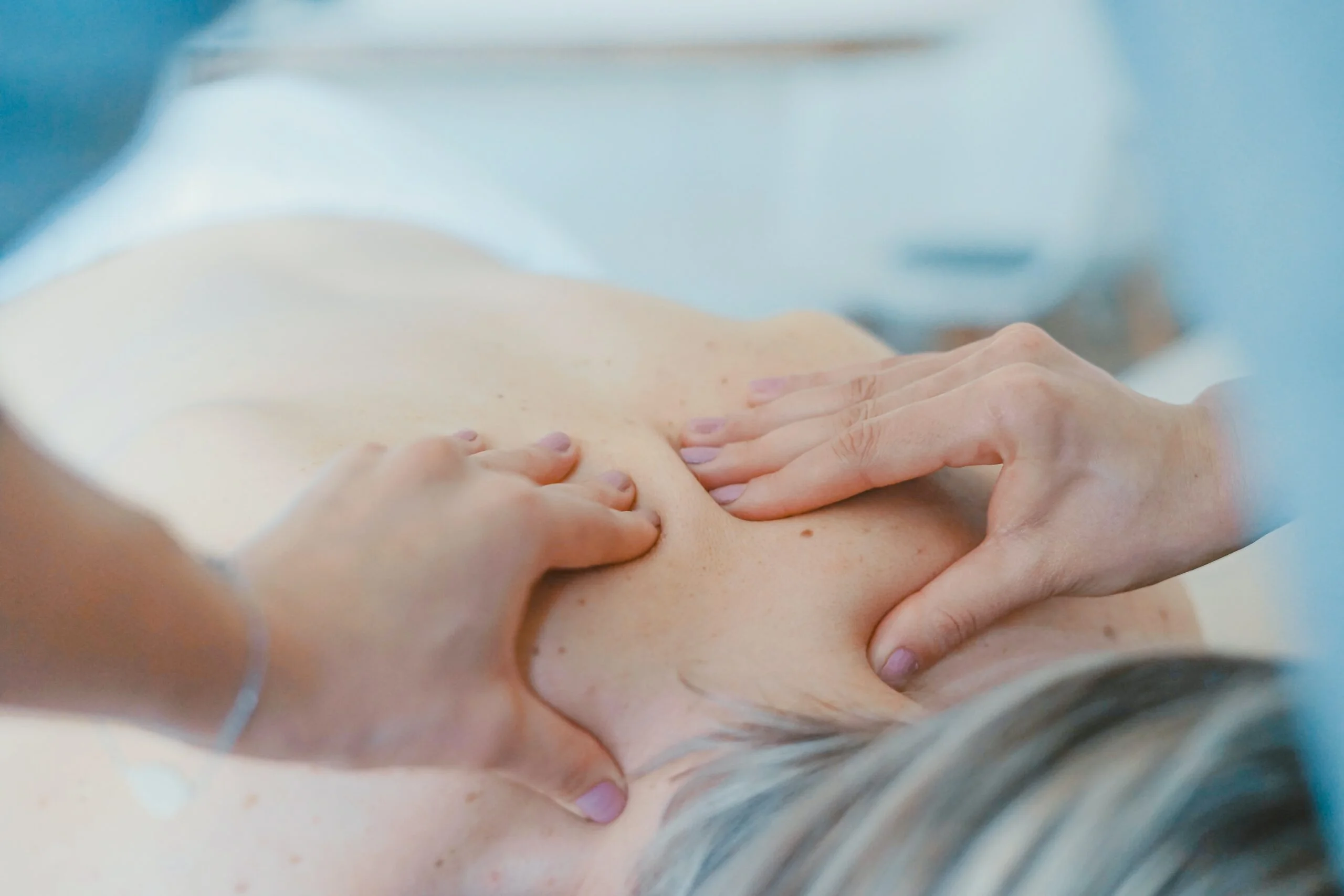 a patient having a back massage